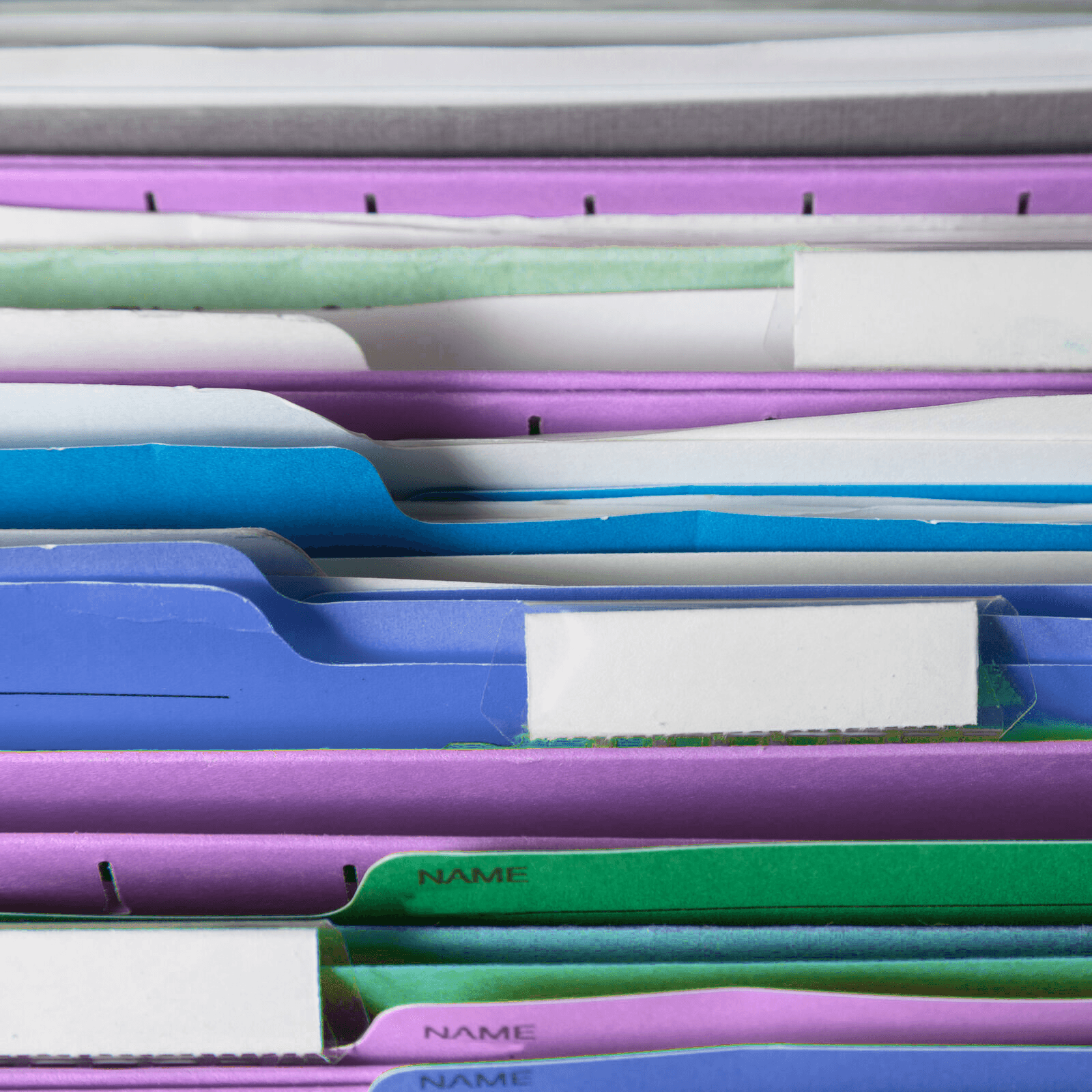 closeup of file folders in an open filing cabinet